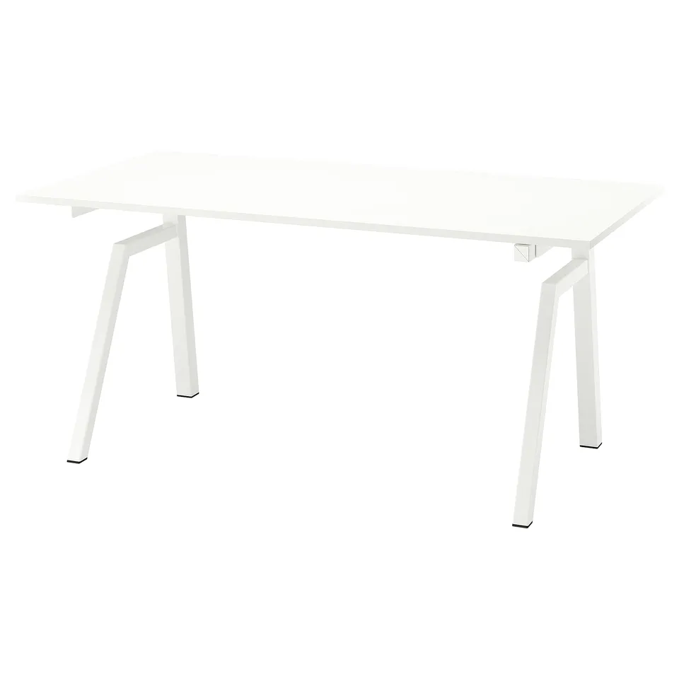 White modern rectangular desk with square legs.