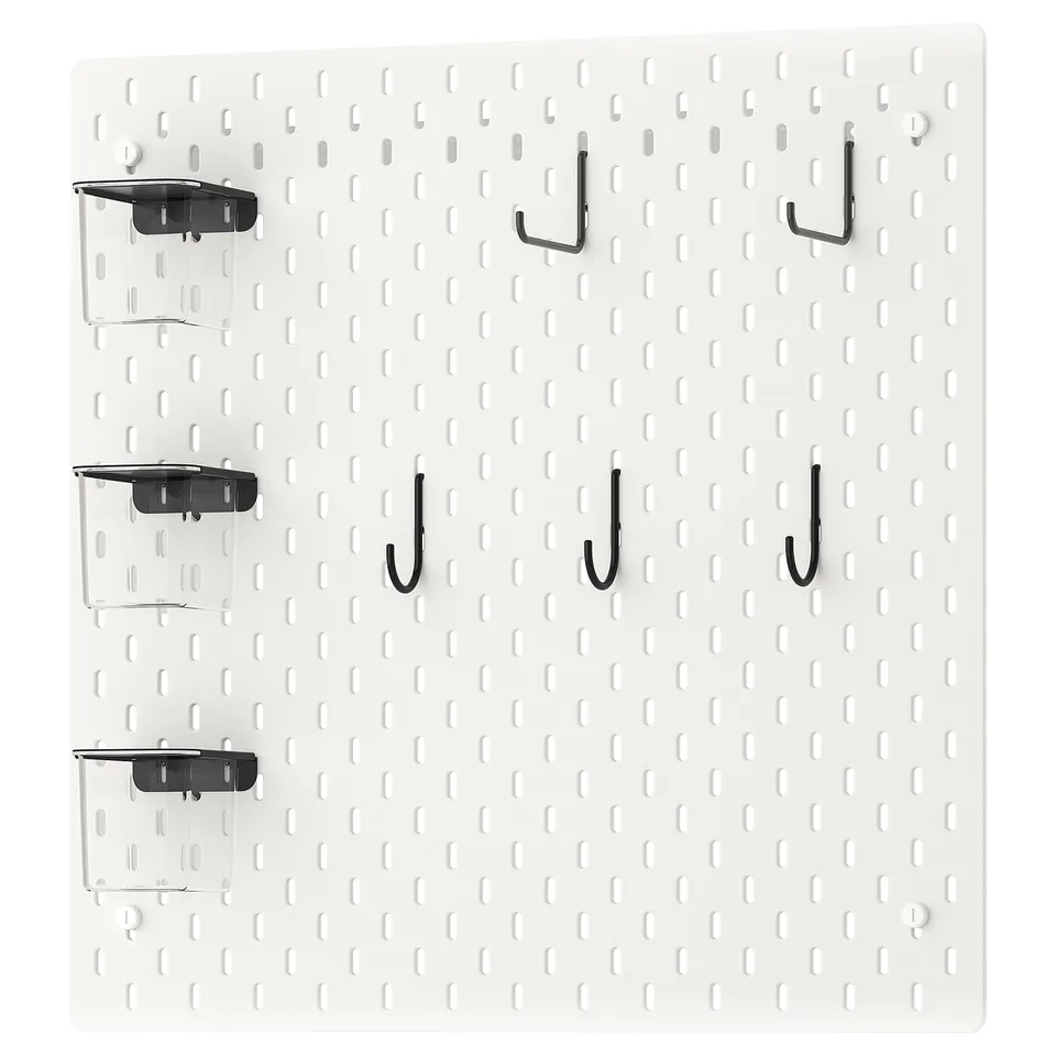 SKÅDIS white pegboard with black hooks and clear containers, wall-mounted, square-shaped, minimalist design.