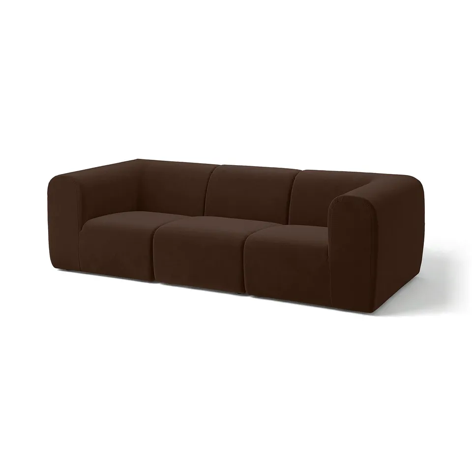 Brown velvet modular sofa with three cushions, sleek modern design, 25-year warranty.