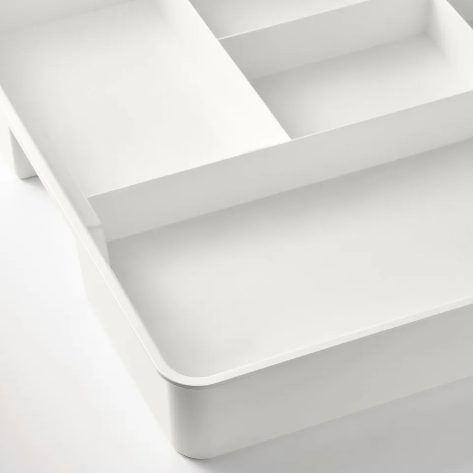 Clear white organiser with multiple compartments, pristine quality.