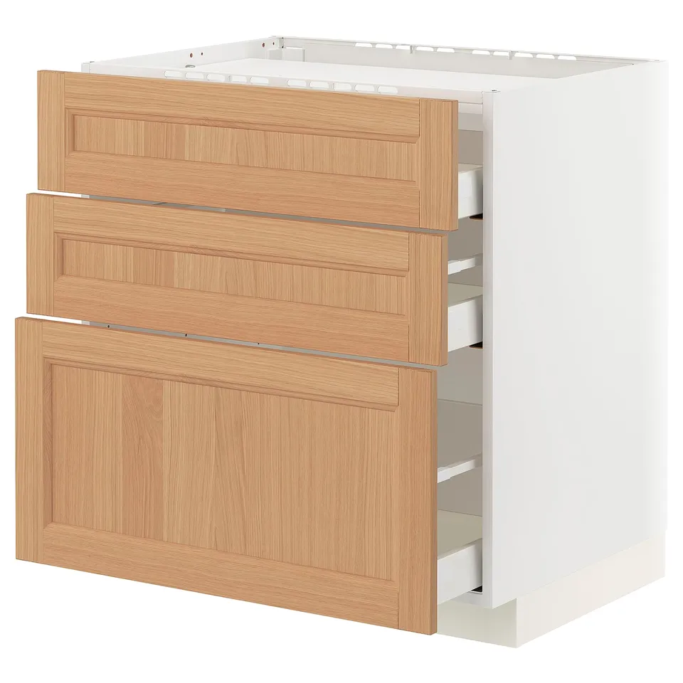 METOD kitchen unit in oak, with multiple drawers, light wood look.
