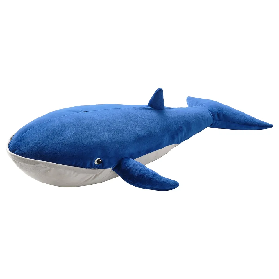 Blue whale-shaped cuddly toy, soft, made of recycled polyester, simple design in blue and grey shades, ideal for comfort and play.