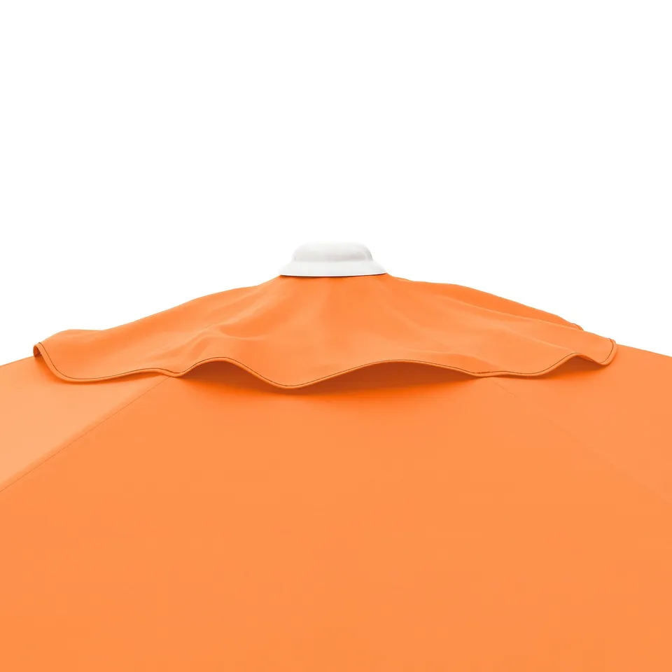 Bright orange parasol with white handle, part of a high-quality outdoor set.
