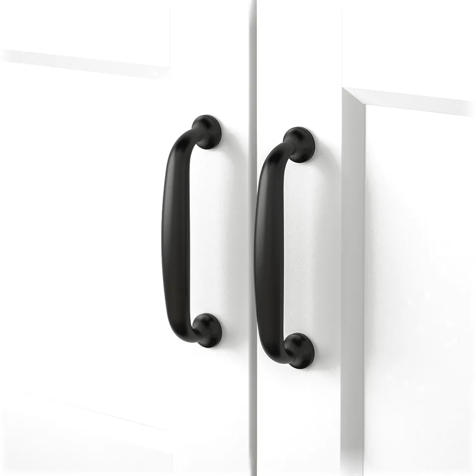 Black handles on white cabinet doors, modern and sleek design.