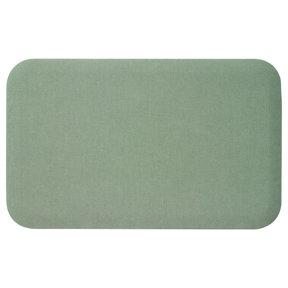 The FREIVID anti-fatigue mat in green, rectangular with rounded edges, offers ergonomic support and pressure relief for standing comfort.
