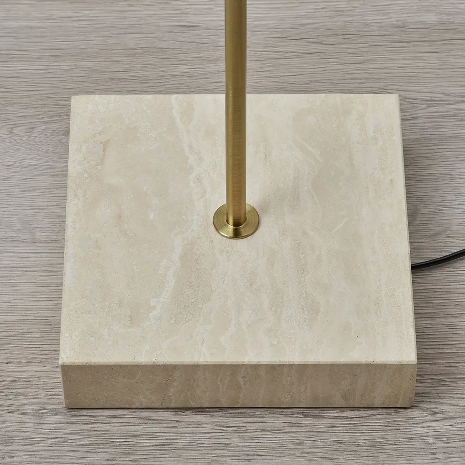 Square travertine lamp base with brass rod, showing premium quality and stability.