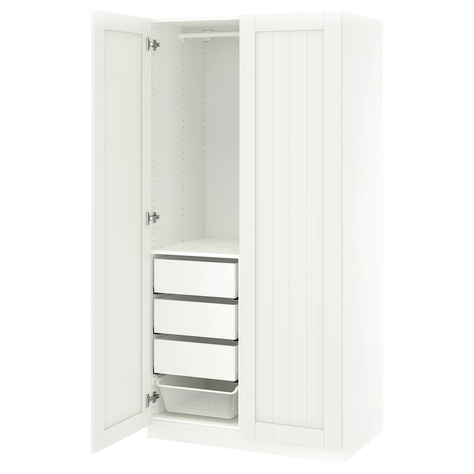 White ikea PAX wardrobe, tall, vertical, open revealing shelves and drawer.