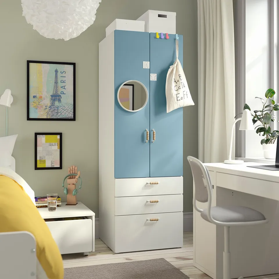 Childs bedroom with blue & white SMÅSTAD wardrobe, desk, chair, mirrors, soft-closing doors & drawers.