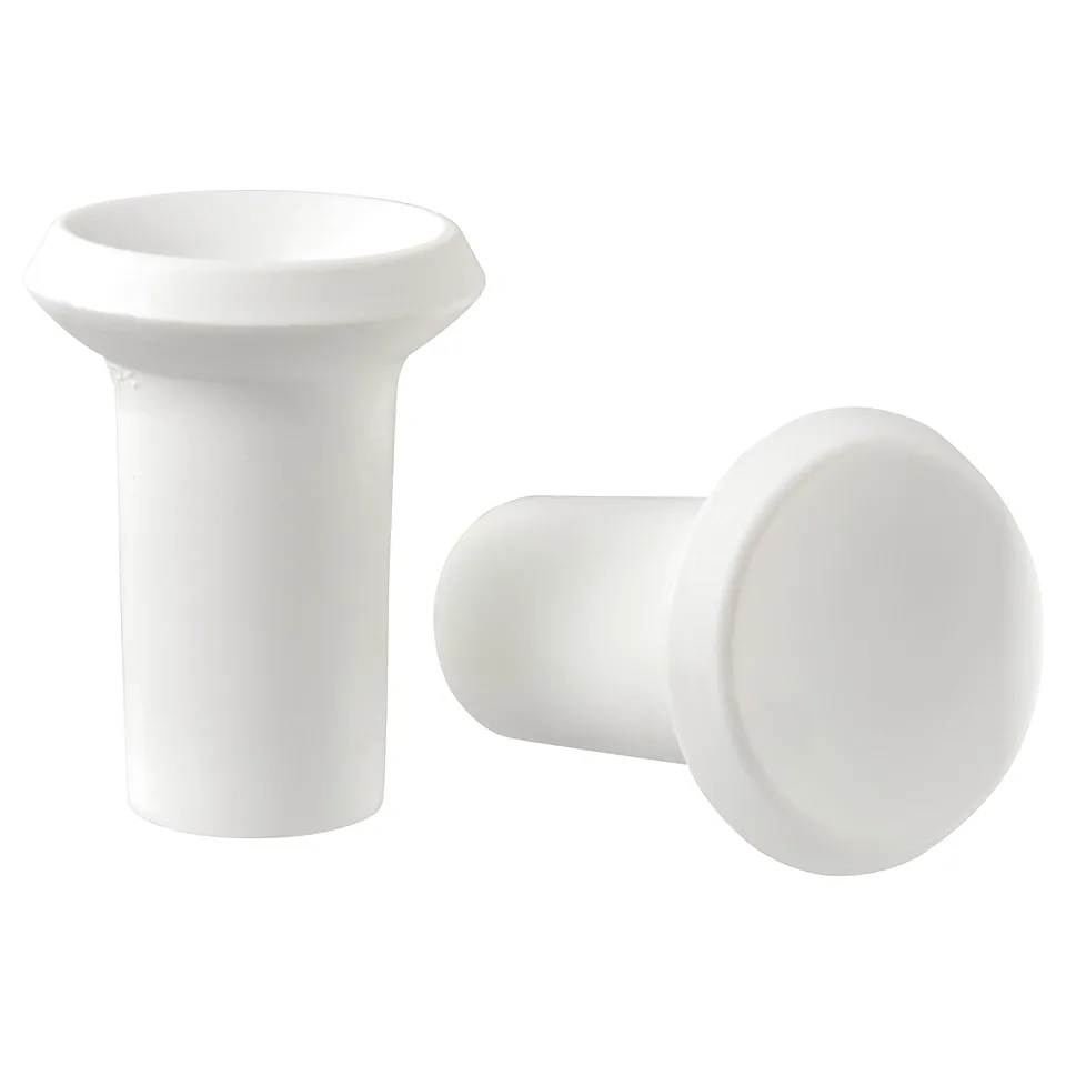 Two white GUBBARP knobs, smooth and rounded, made from polypropylene plastic.