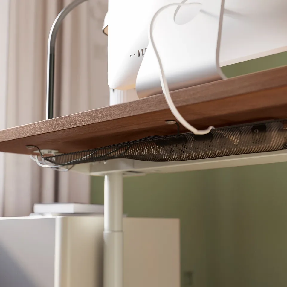 Desk with wooden top and metal legs, adjustable cable management.