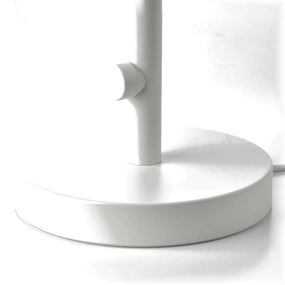 Modern table lamp with frosted glass shade, concrete base, and sleek white finish.