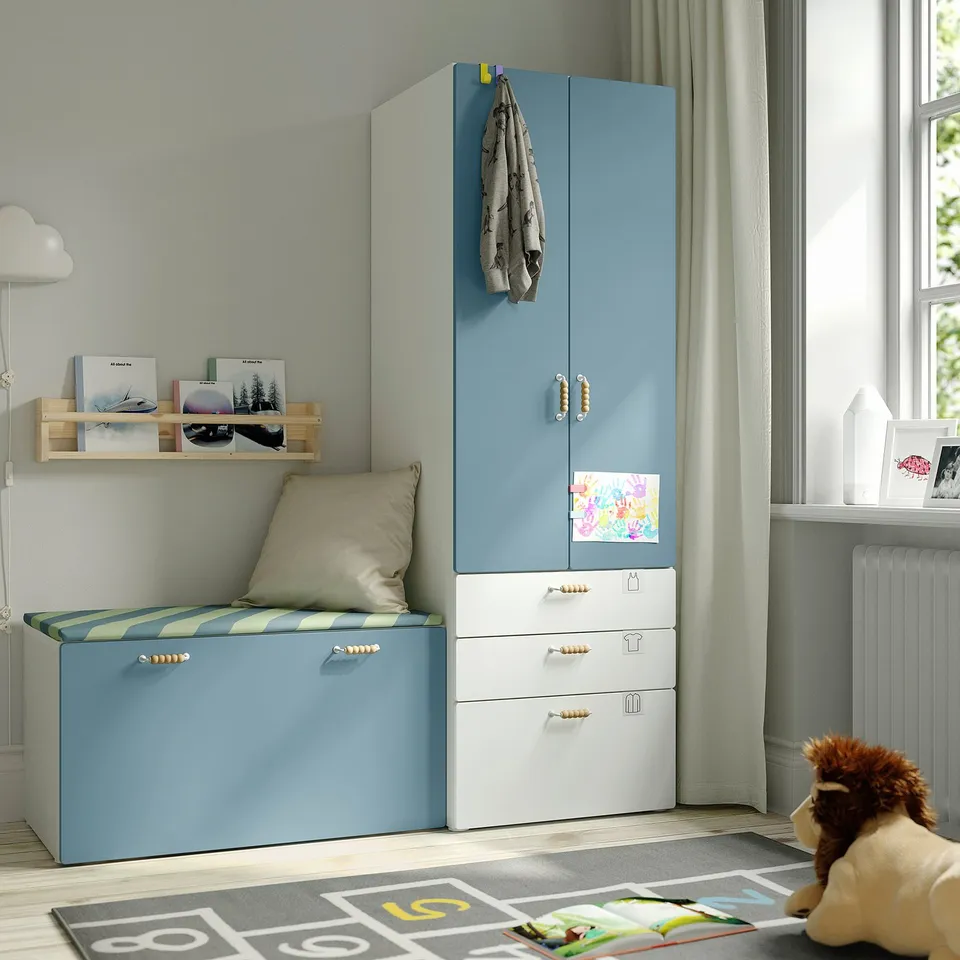 Light blue SMÅSTAD wardrobe, drawers, bench, and shelves in childs room, toy horse, cuddly toy.