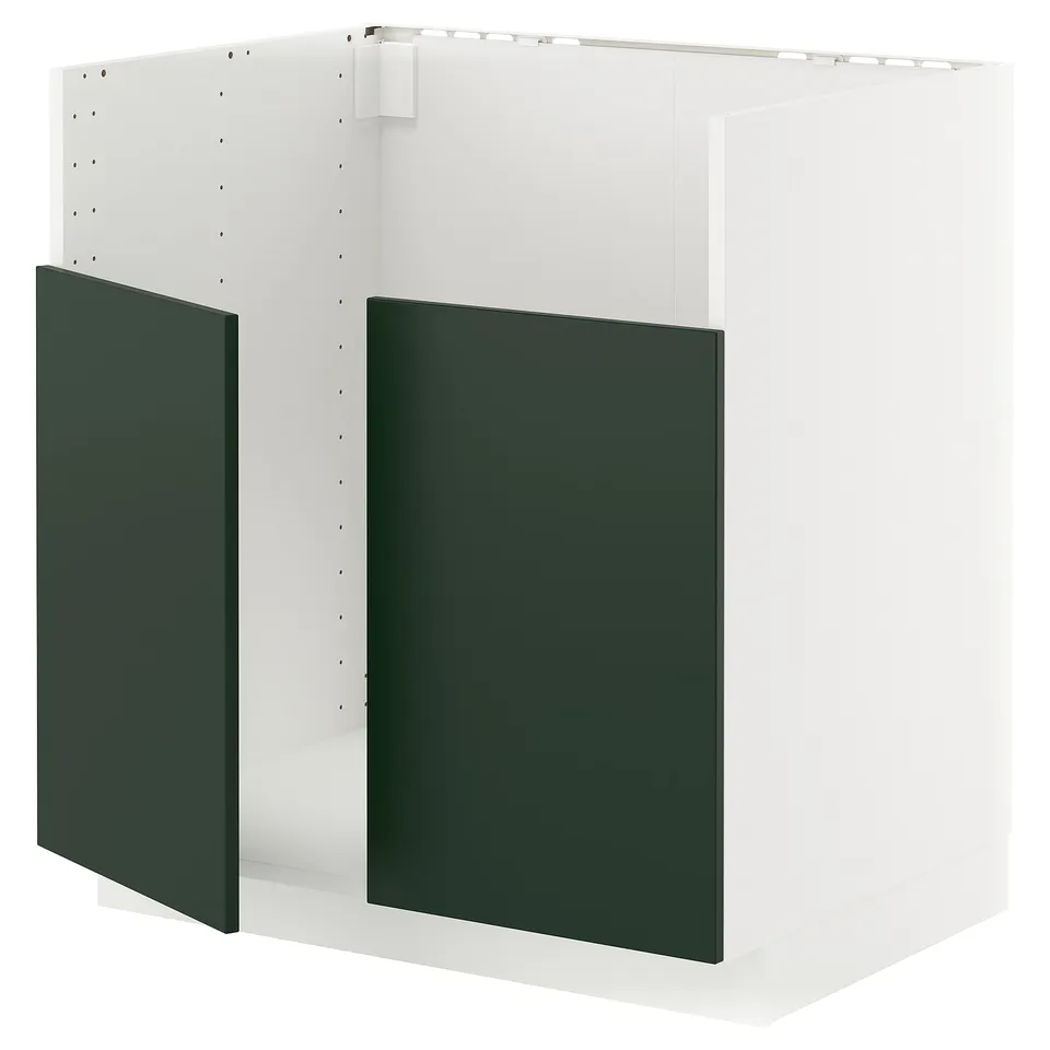 A white METOD kitchen cabinet with deep green doors, featuring a sturdy frame and snap-on hinges.