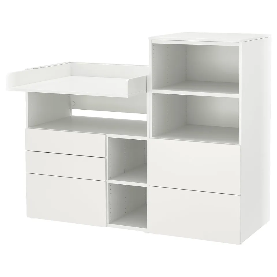 White SMÅSTAD changing table with shelves and drawers.