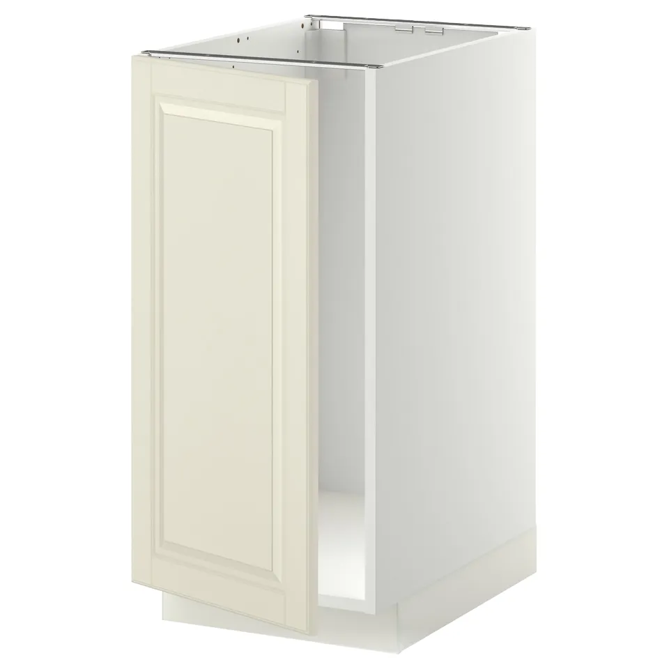 A white METOD kitchen cabinet with an off-white door featuring bevelled edges. It has a boxy shape and snap-on hinges for easy mounting and cleaning.