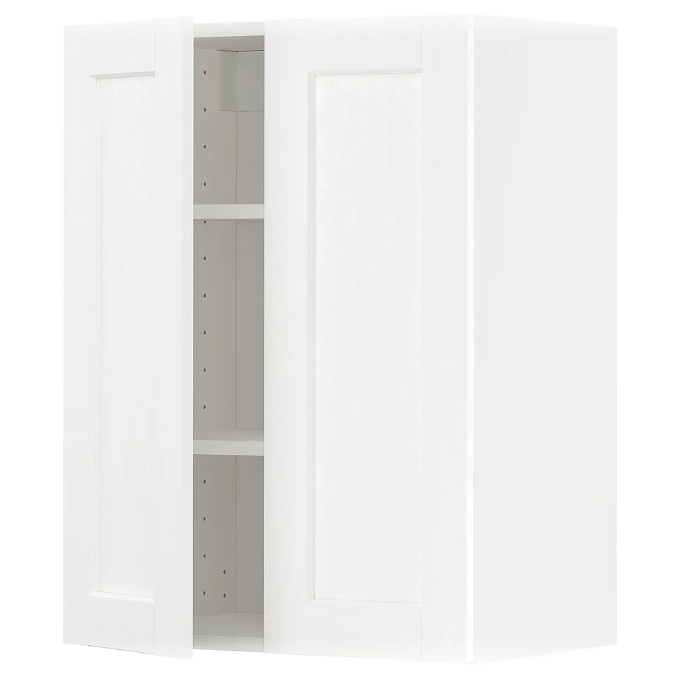White METOD kitchen cabinet with adjustable shelves and nickel hinges.