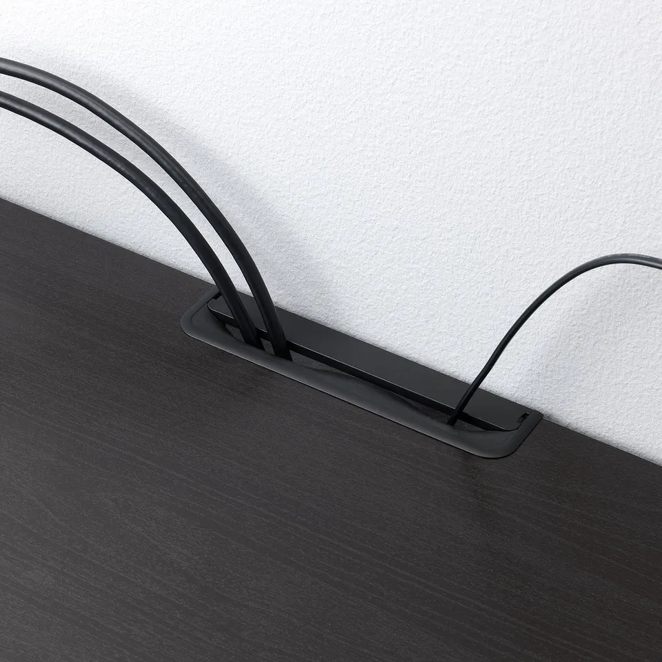 Black tv bench with curved cable management, keeping cables tidy.