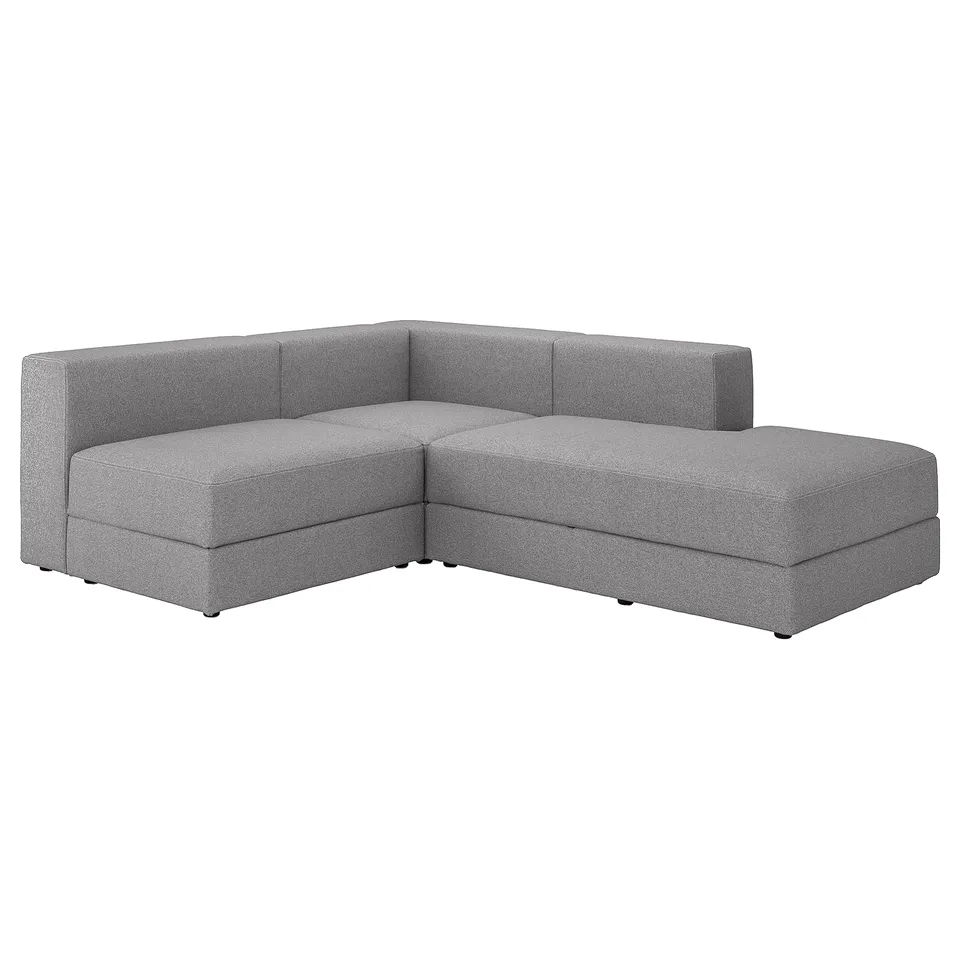 JÄTTEBO sectional sofa, grey, modern minimalist design with clean lines, plush cushions, and hidden storage.