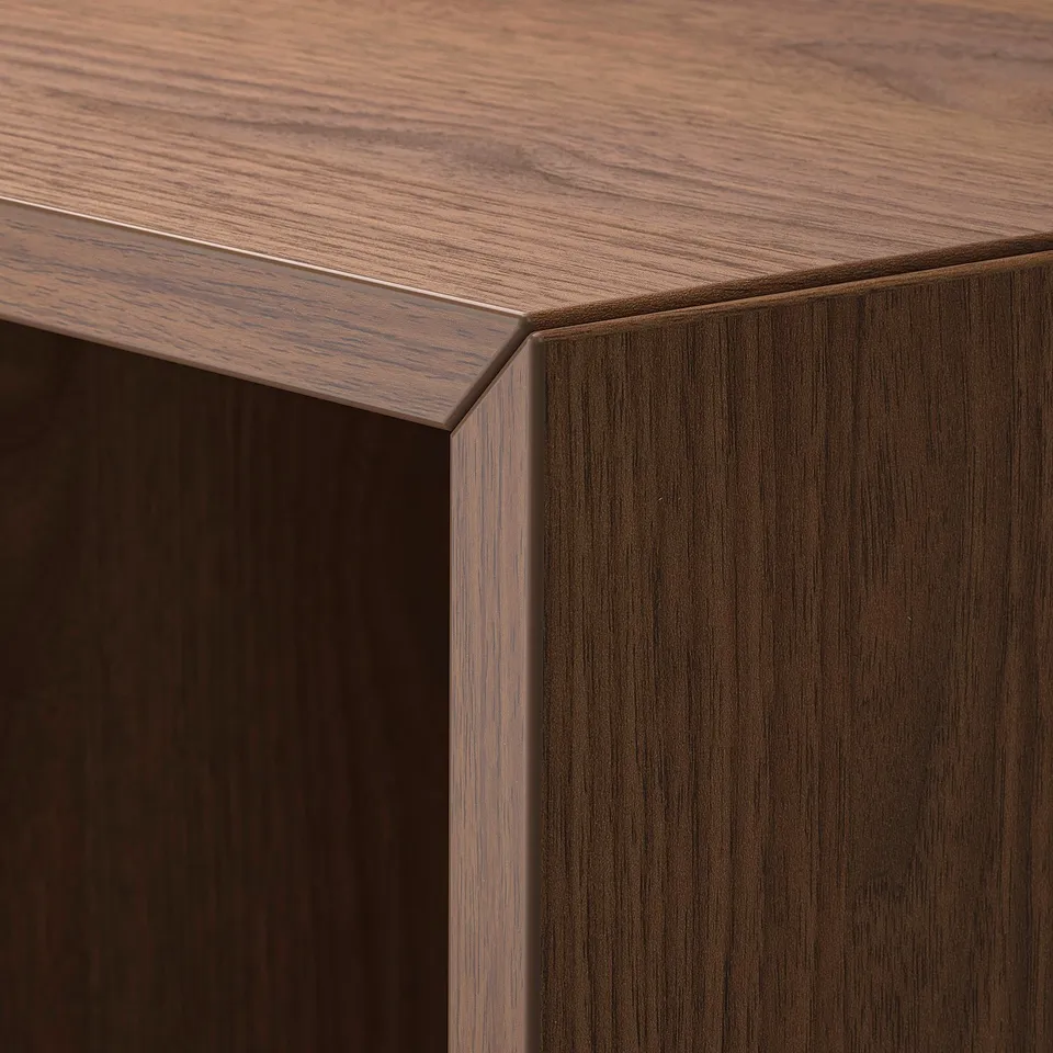 Wooden corner detail: smooth, polished surface; sturdy join.
