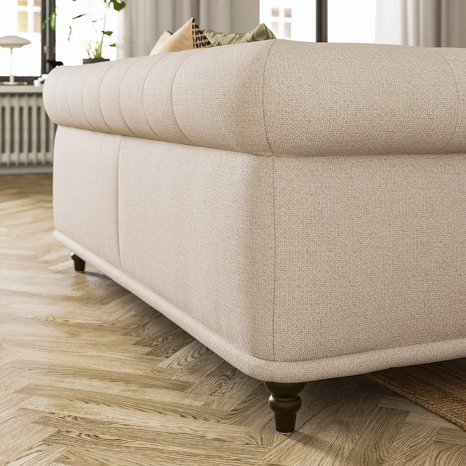 Beige VISKAFORS sofa, soft round shapes, cosy invite.