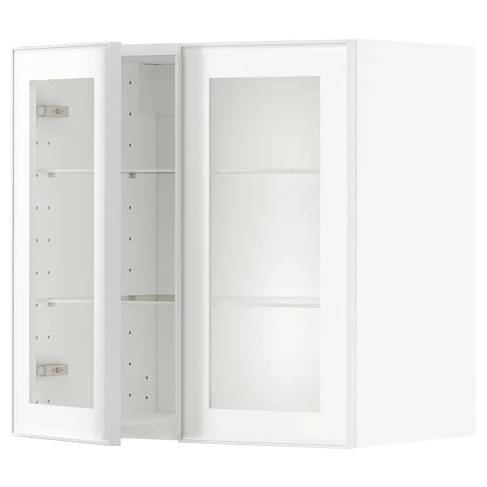White METOD kitchen cabinet with glass door, metal frame, adjustable shelves.