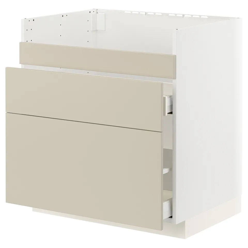 Modern light beige kitchen cabinet with smooth surfaces and soft-closing drawers.