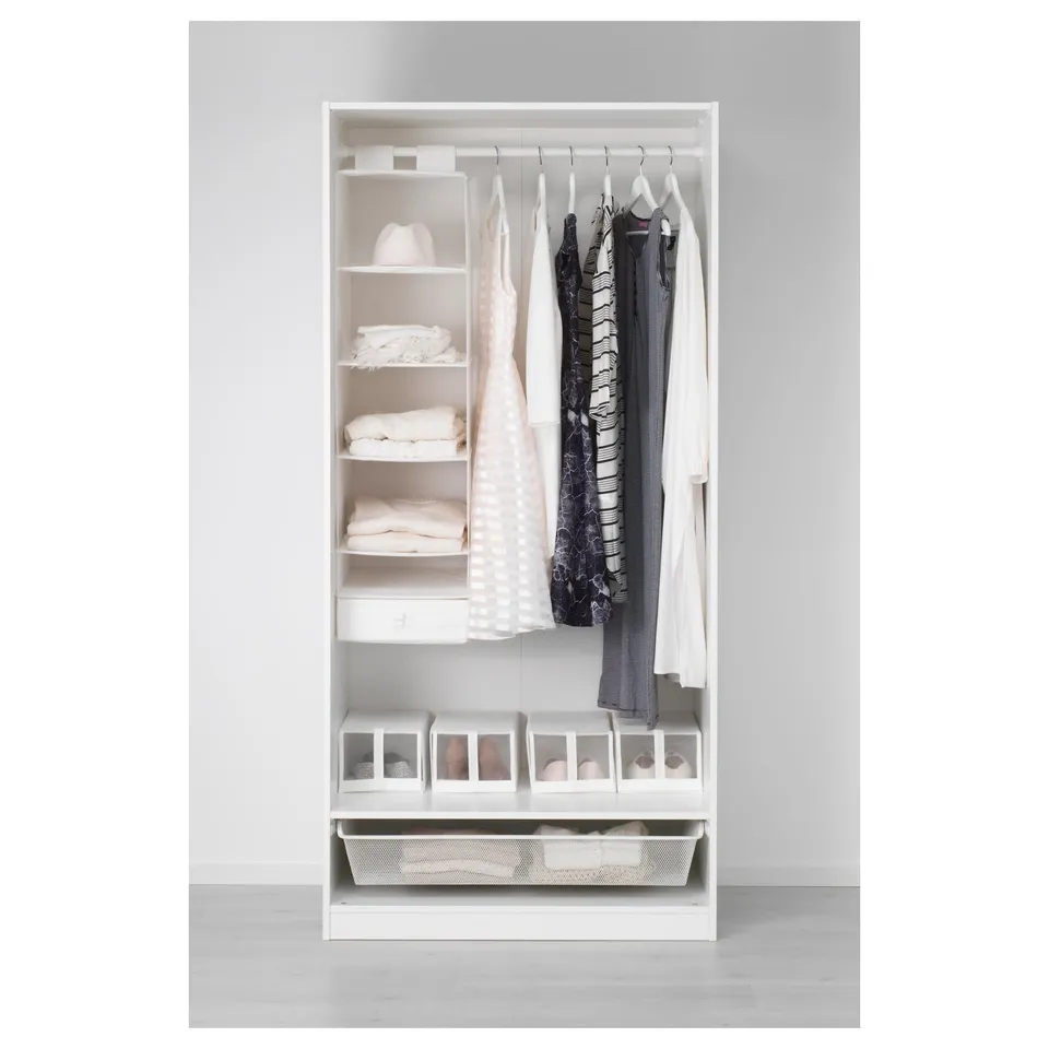 PAX wardrobe organises clothes & accessories with hanging space, shelves, & boxes. Sleek & minimalist design.