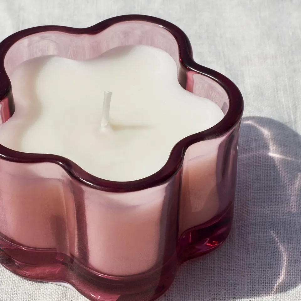 MORKULLA Scented candle in glass, Lilac assorted colours, 12 hr