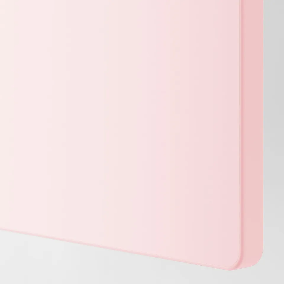 Close-up of smooth, light pink product surface, showing quality finish and clean design.