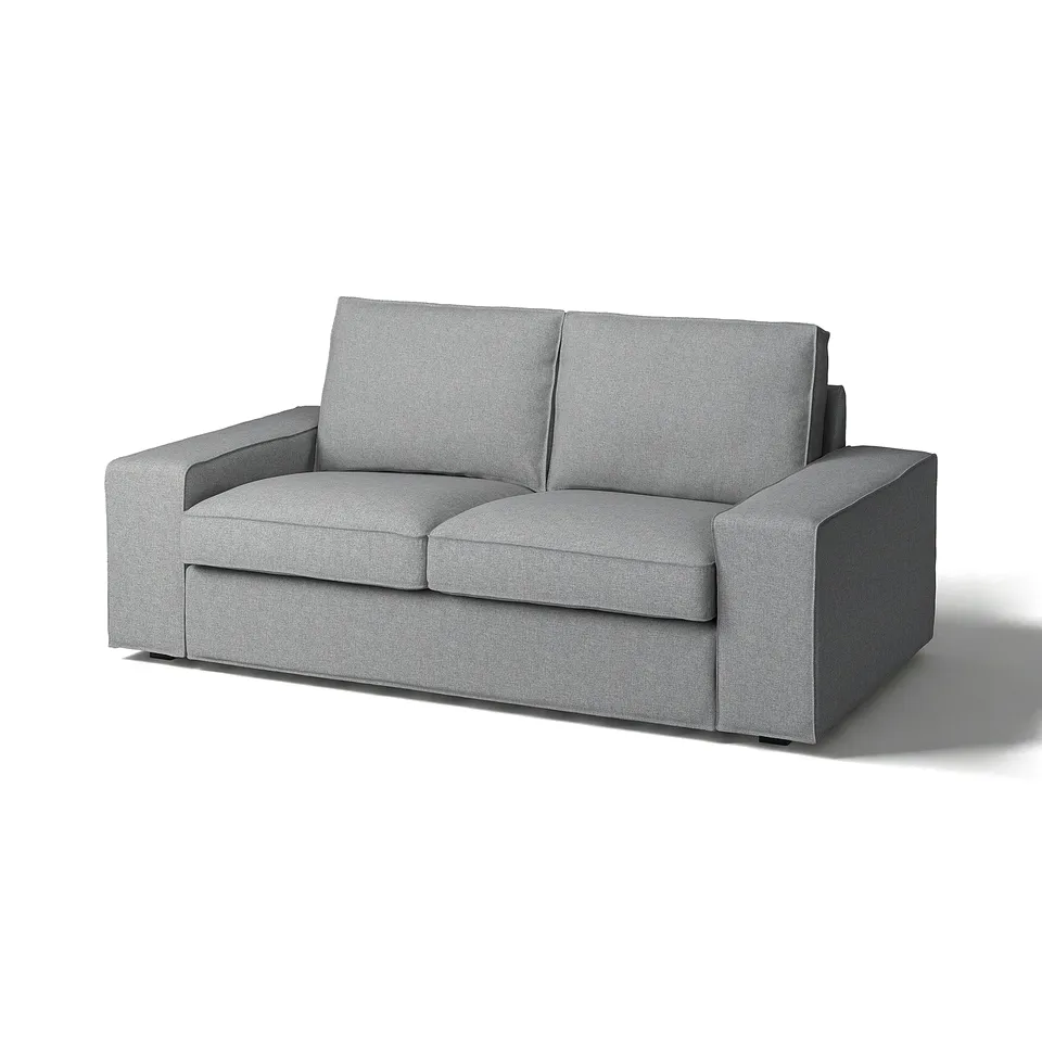 Modern grey KIVIK sofa, minimalist design with low armrests, comfortable for relaxation.