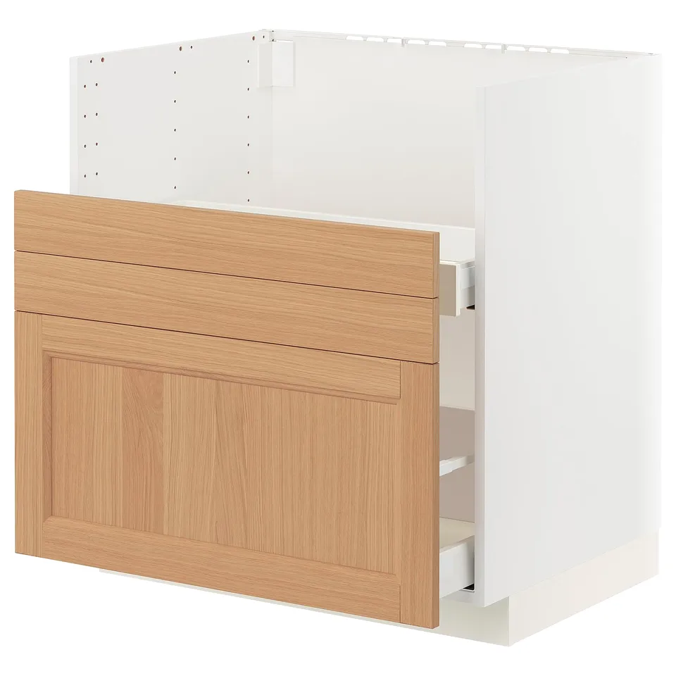 Modern white ikea METOD kitchen cabinet with oak drawer, sleek design.
