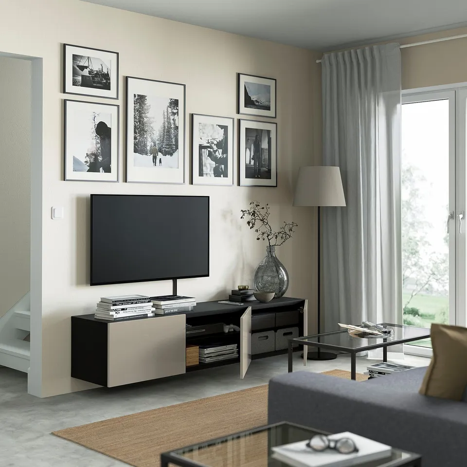 Modern living room with wall-mounted tv bench & shelves.