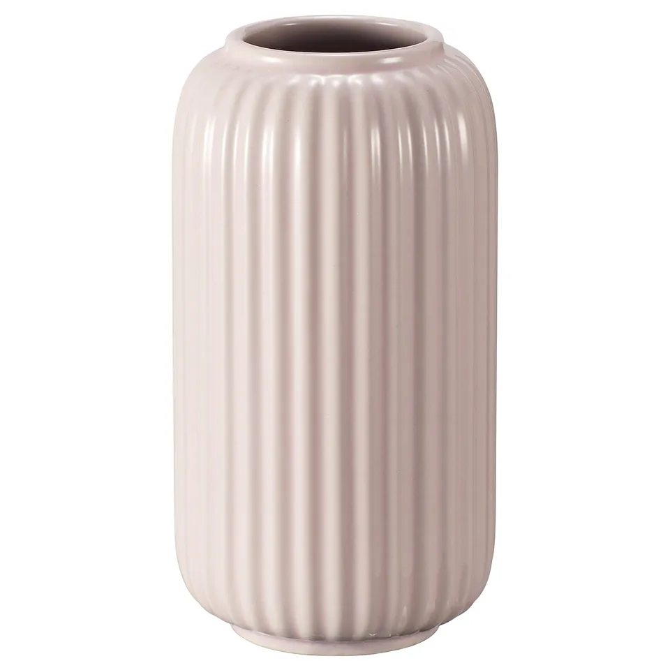 Pink STILREN stoneware vase with ribbed texture, tall and minimalist.