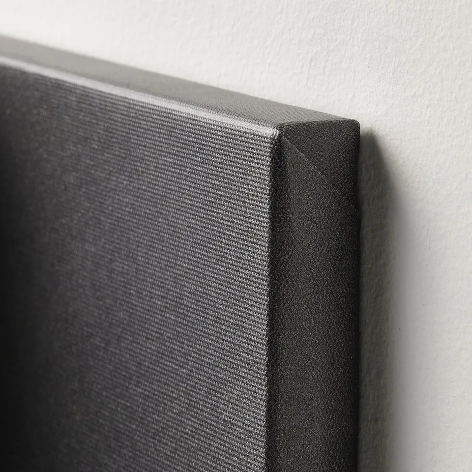 Close-up of canvas-print edge, showing high-quality texture and deep frame.