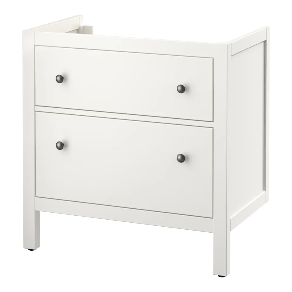 An ikea HEMNES white bathroom vanity in rectangle shape with drawers and knobs.