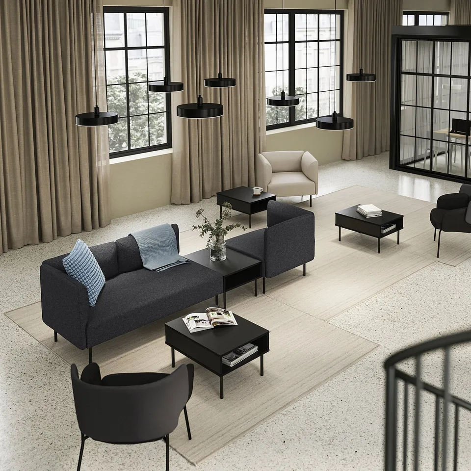 Contemporary living room: grey LILLEHEM sofas, black coffee tables, black pendant lights, large windows, light-colored floor.