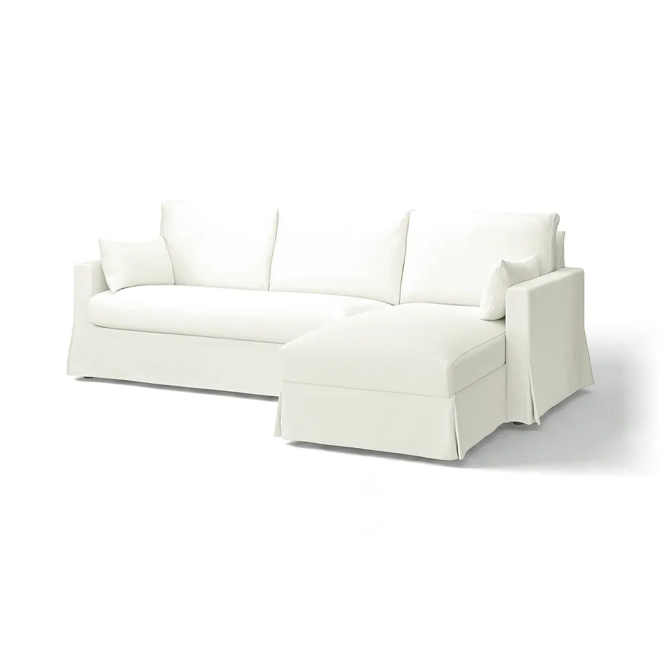 White l-shaped HYLTARP sectional sofa, sleek design, durable cotton-polyester fabric.