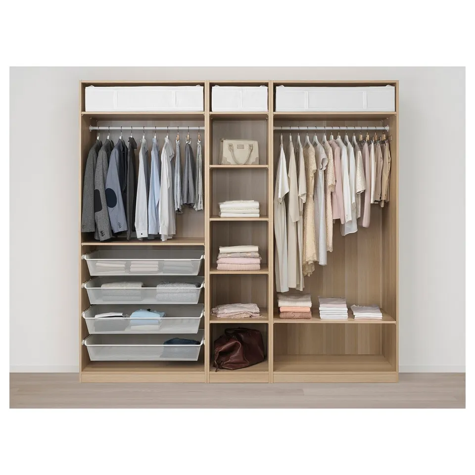 Organised closet with clothes hangers, shelves, and mesh baskets for folded items.