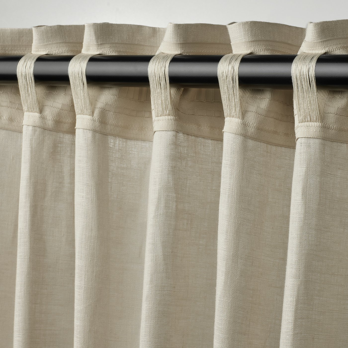 Curtains with multi-header tape, designed for rod or rail use. The tape facilitates easy rod pocket or tab hanging.