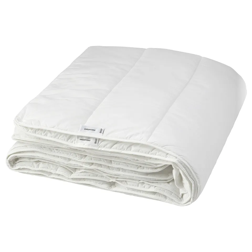 SMÅSPORRE white duvet with cotton-polyester blend, folded, from IKEA.