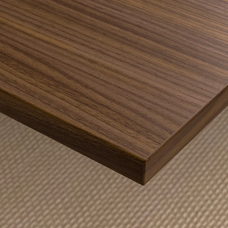Sleek, polished wooden tabletop with clean edges. Patented walnut veneer finish, expertly crafted for durability.