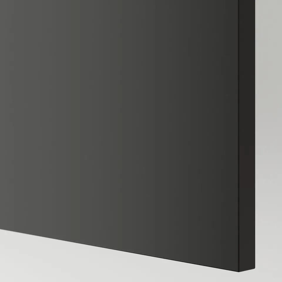 Sleek black kitchen panel, smooth finish, high-quality craftsmanship.