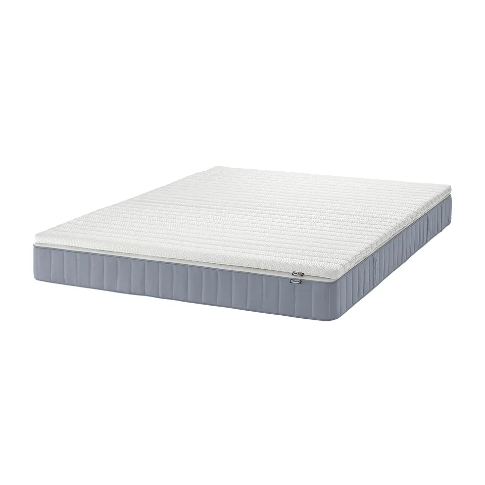 IKEA VESTERÖY grey foam mattress, rectangular, smooth surface.