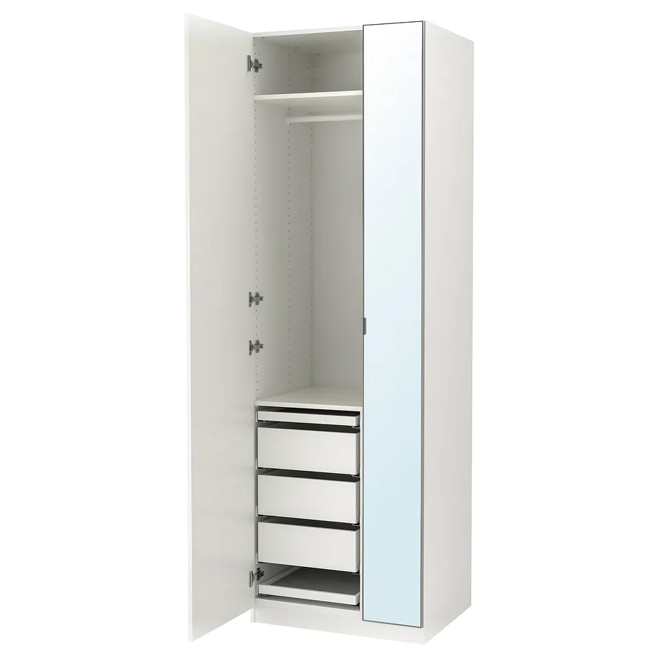A white ikea PAX wardrobe with mirrored doors, featuring shelves, drawers, and trays for storage.