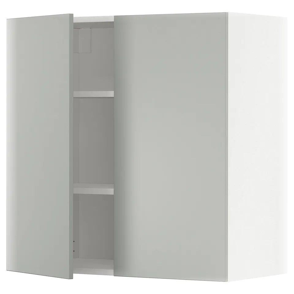 Modern white METOD kitchen cabinet with light grey doors and shelves.