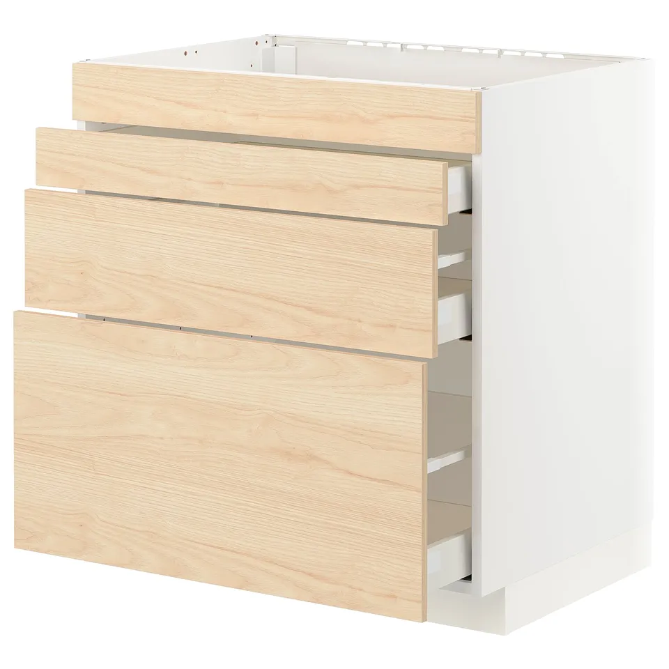 A white and light wood-colored kitchen cabinet with multiple drawers.