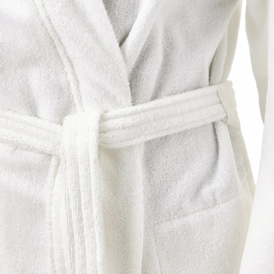 White bathrobe with adjustable belt, side pockets, soft terry inside and out.