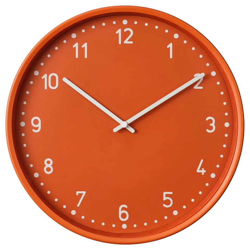 An orange clock named BONDIS with a silent mechanism. White numbers and hands on a round face.