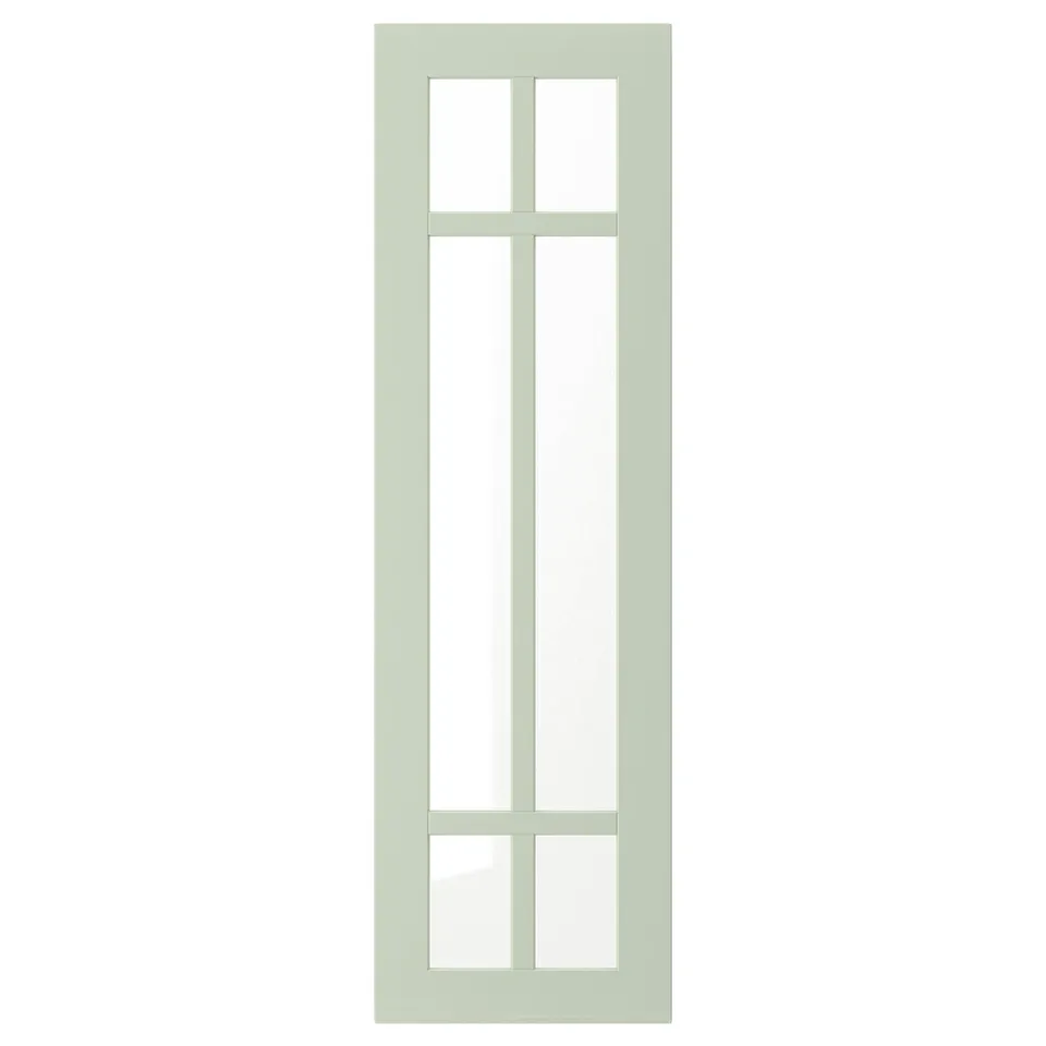 A STENSUND light green cabinet door with a crosshatched glass panel design.
