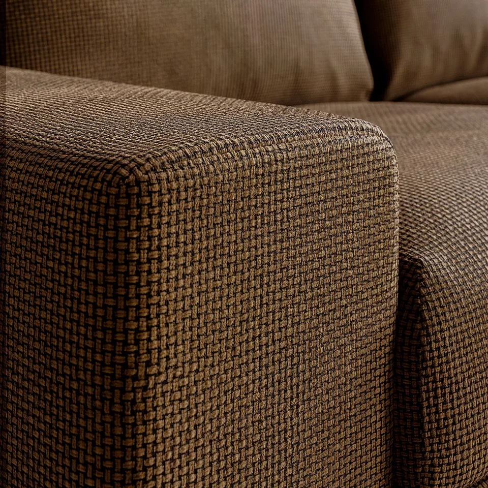 Close-up of VIMLE sofas plush, textured fabric. Shows intricate weave and comfortable, rounded cushions.